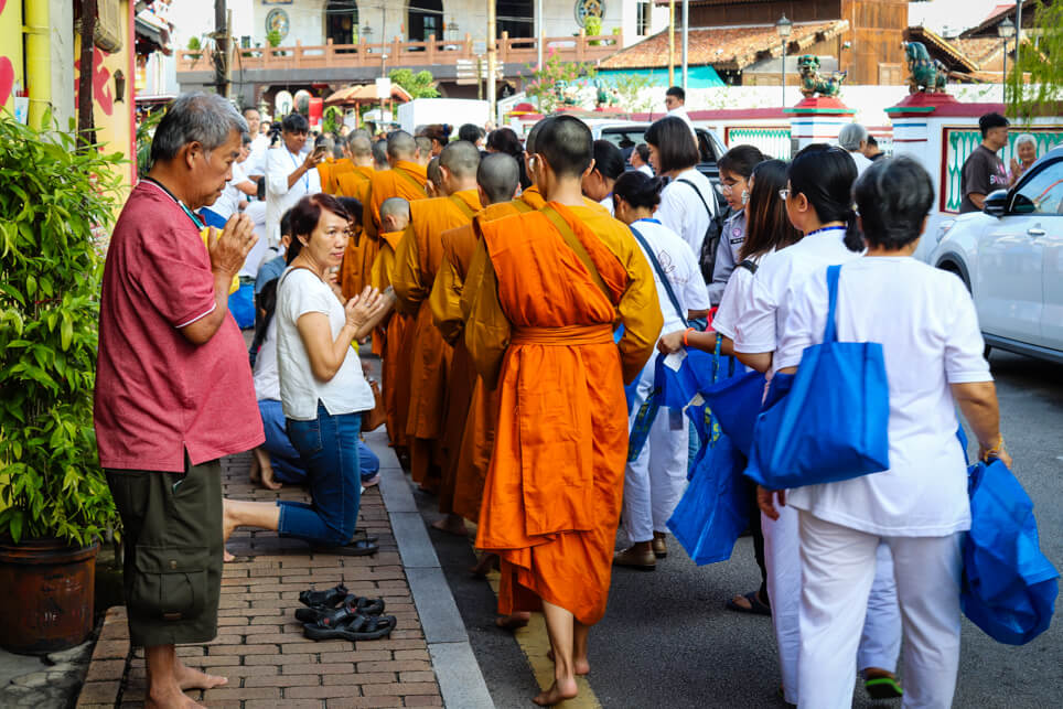 Monks near the temple in Malacca Monks near the temple in Malacca
